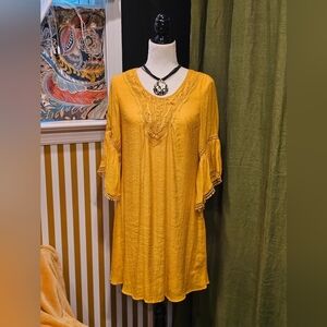 Chic Mustard Midi Dress with Crochet Details. It Is Lined With Satin.